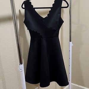 Scalloped black dress